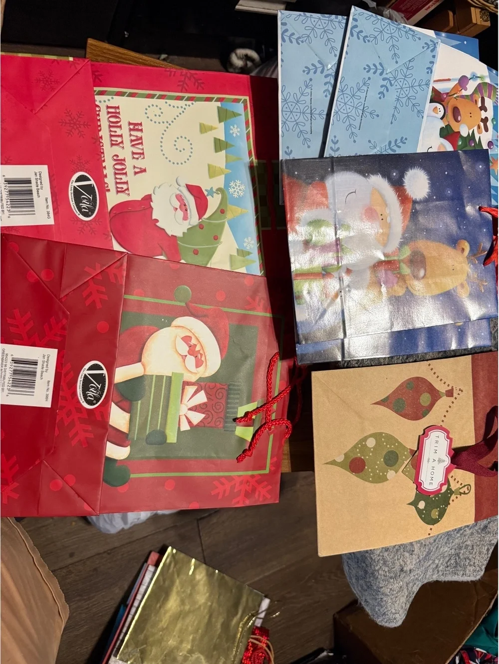 Set of 4 Christmas Holiday Gift Bags with Festive Designs